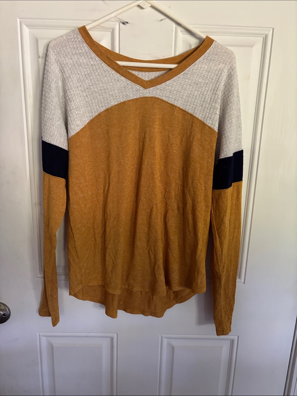 Women’s size Large long sleeved blouse